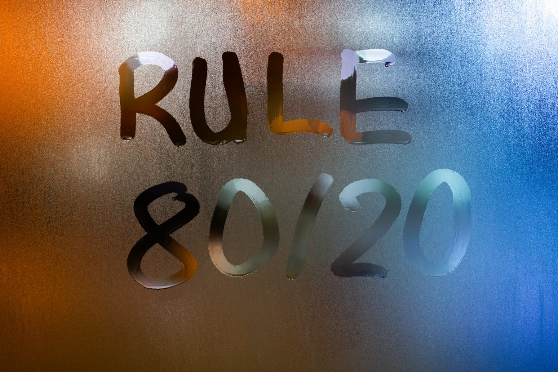 phrase-rule-80-by-20-pareto-principle-handwritten-classic-blue-night-wet-window-glass-with-selective-focus.jpg